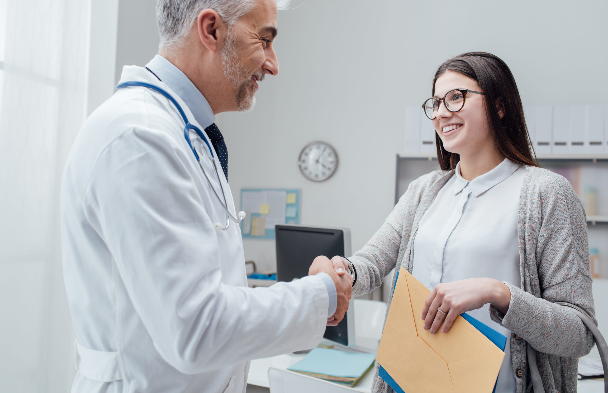 Doctor and patient shaking hands Patients and PCR Testing for Infectious Disease